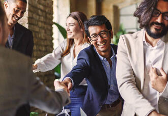 Small business team collaborating with support from a trusted financial partner